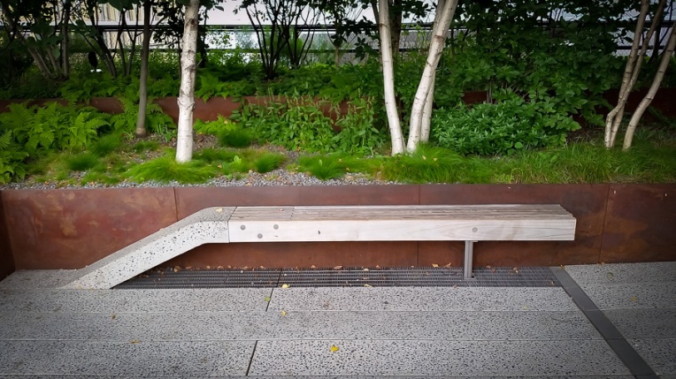 Bench grows out of the floor. Reminiscent of a railway junction.